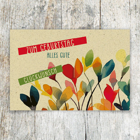 Vergrößerte Abbildung Nachhaltige Geburtstagskarte aus Naturkarton mit bunten Blüten und dem Aufdruck 'Zum Geburtstag Alles Gute – Glückwunsch'